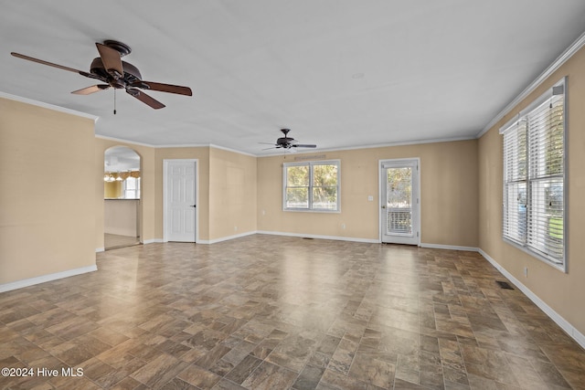 unfurnished living room with crown molding and ceiling fan