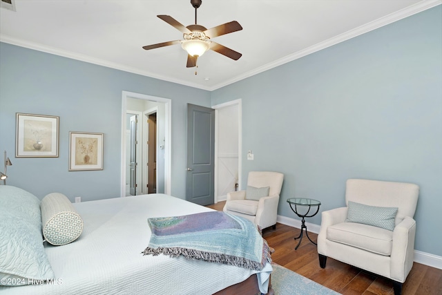 bedroom with dark hardwood / wood-style floors, ceiling fan, and ornamental molding