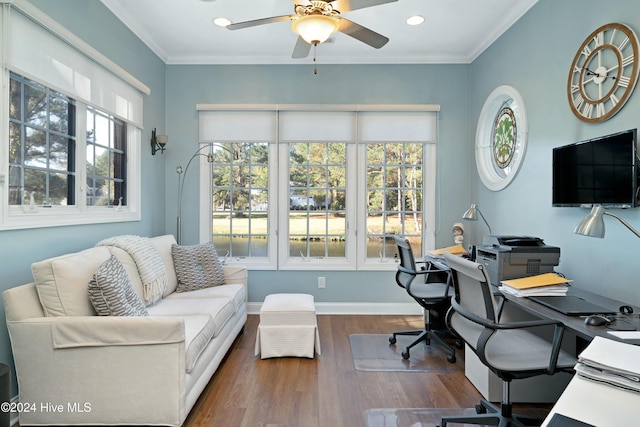 home office with dark hardwood / wood-style floors, ceiling fan, and ornamental molding