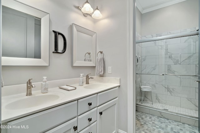 bathroom featuring tile patterned floors, vanity, crown molding, and walk in shower