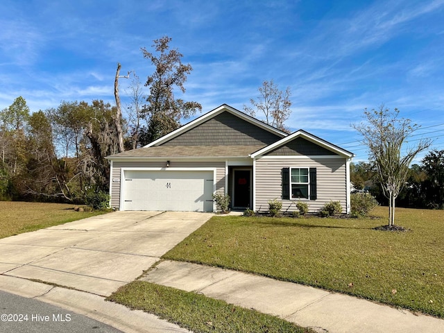 view of front facade featuring a front yard and a garage