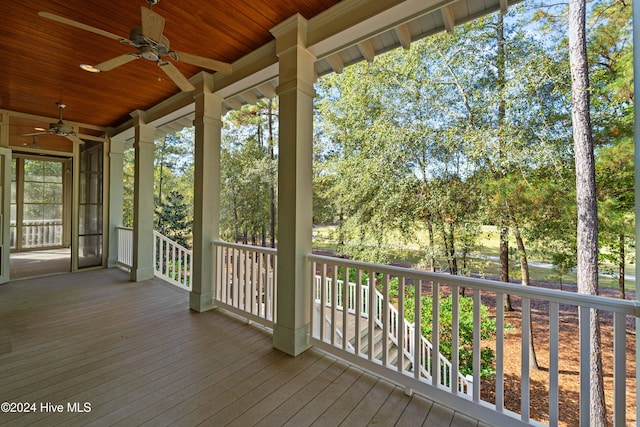 deck with a porch and ceiling fan