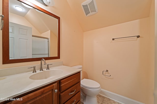 bathroom featuring visible vents, toilet, a shower stall, vanity, and tile patterned floors