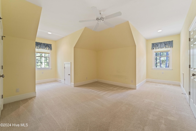 additional living space with carpet floors, recessed lighting, ceiling fan, and baseboards