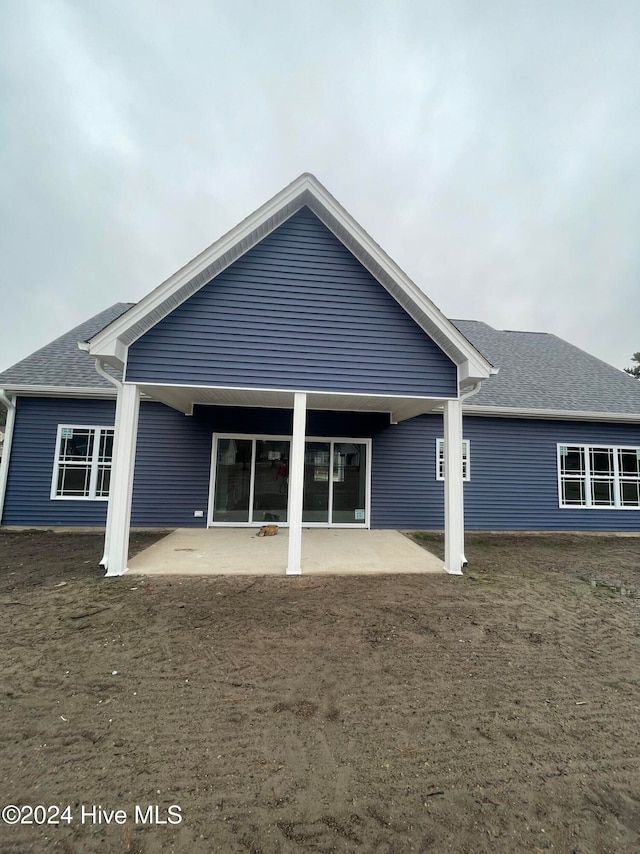 rear view of house with a patio area