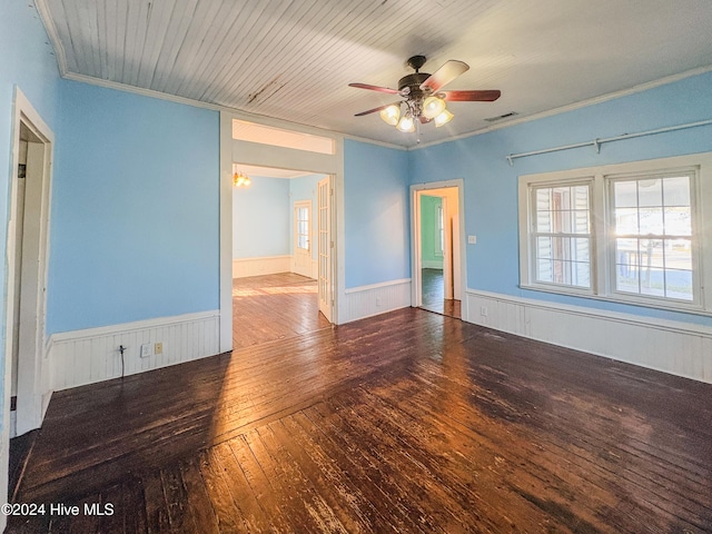 empty room with hardwood / wood-style floors, ceiling fan, and ornamental molding