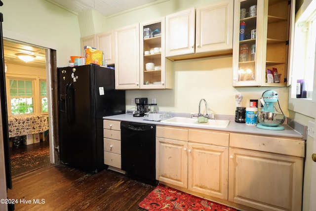 kitchen with dark wood-type flooring, sink, and black appliances