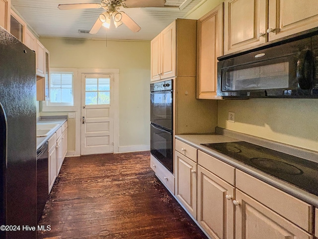 kitchen with black appliances, ceiling fan, sink, and dark wood-type flooring