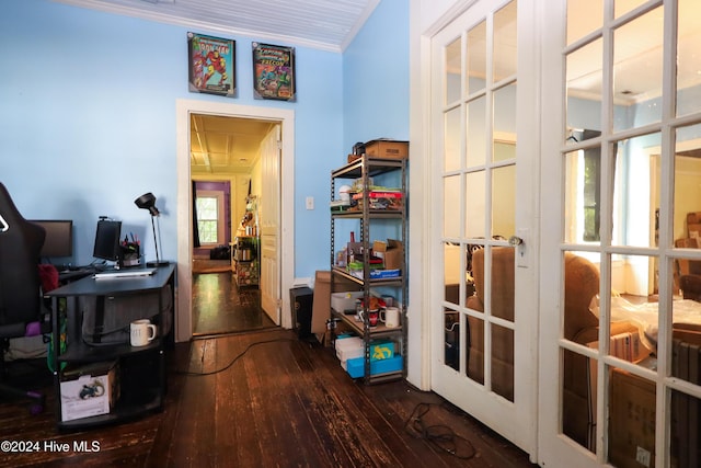 corridor featuring dark hardwood / wood-style flooring, french doors, and ornamental molding