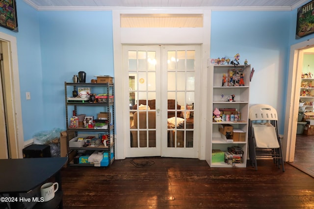 doorway to outside featuring ornamental molding, dark wood-type flooring, and french doors