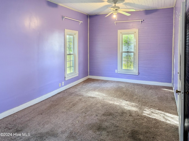 carpeted empty room with ceiling fan