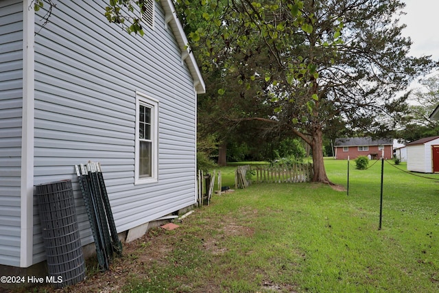 view of yard featuring central AC