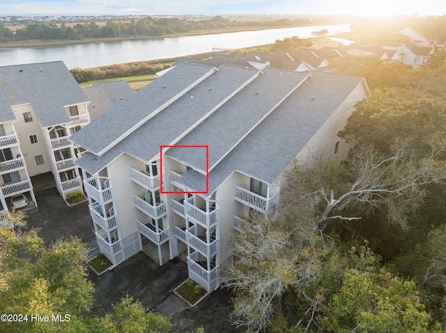 drone / aerial view with a water view