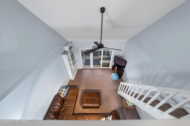 living room featuring ceiling fan