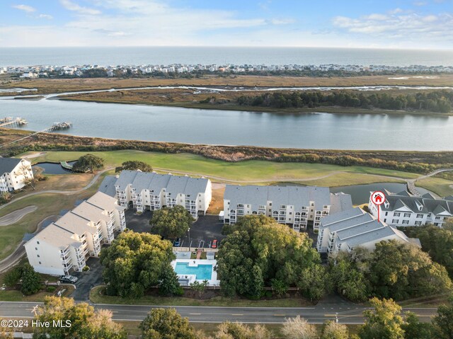 bird's eye view with a water view