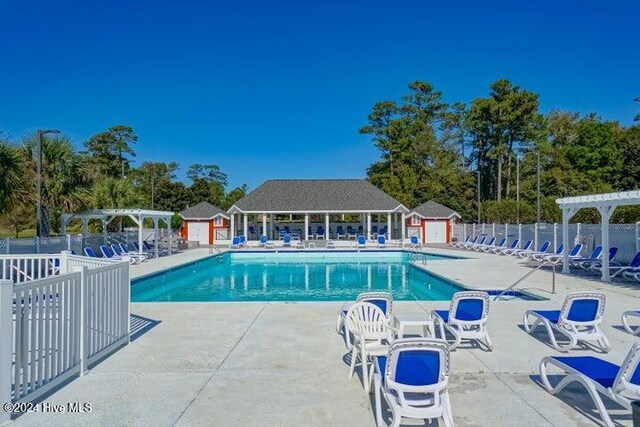 view of swimming pool with a gazebo, a patio area, and a pergola