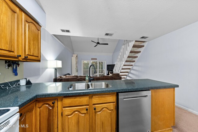 kitchen featuring kitchen peninsula, light wood-type flooring, white appliances, and vaulted ceiling