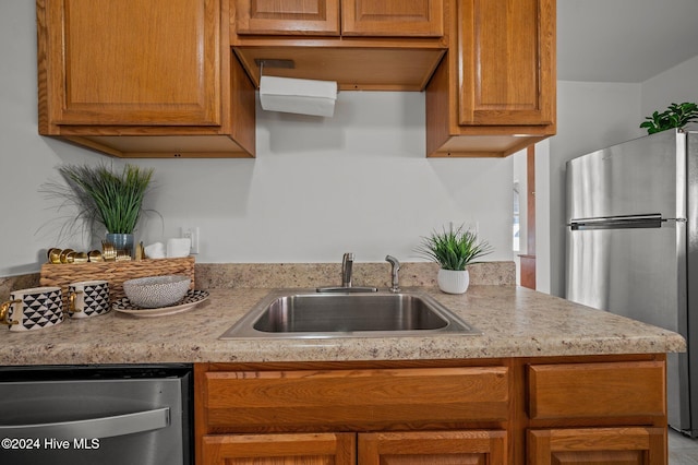 kitchen featuring sink and appliances with stainless steel finishes