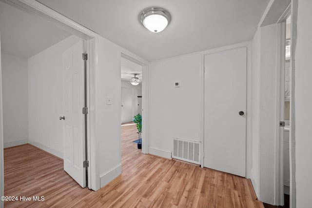 hallway featuring light hardwood / wood-style flooring