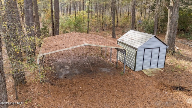 exterior space with a shed