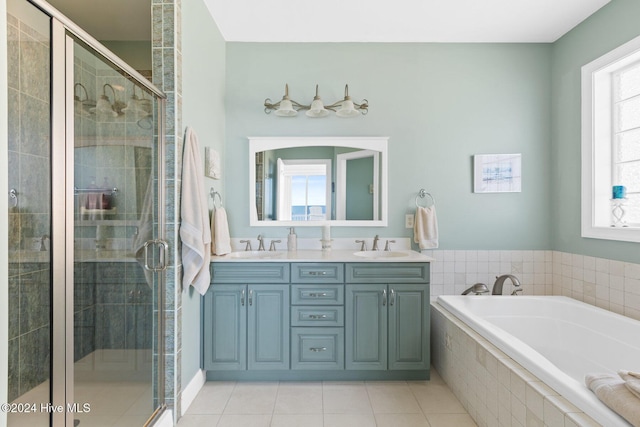 bathroom featuring vanity, separate shower and tub, and tile patterned floors