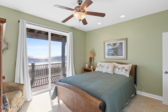 bedroom with access to outside and ceiling fan