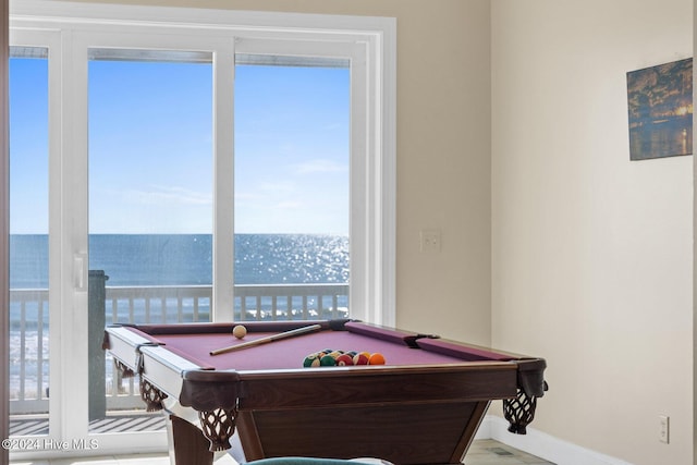 recreation room featuring a water view and billiards