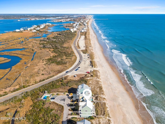 aerial view with a beach view and a water view