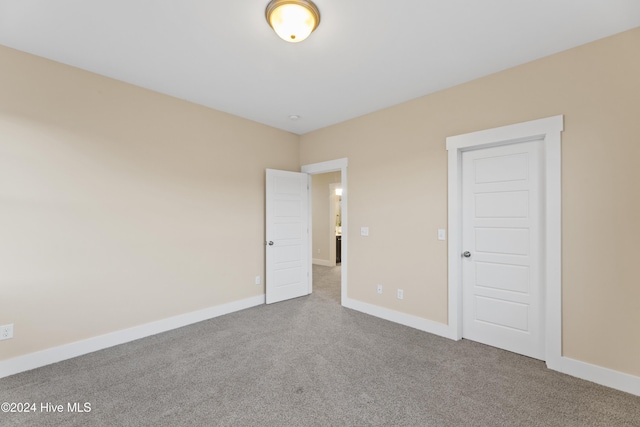 unfurnished bedroom with a closet