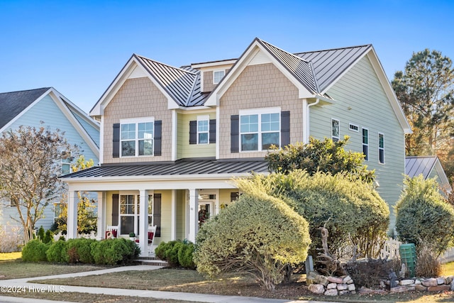 view of front of home featuring covered porch