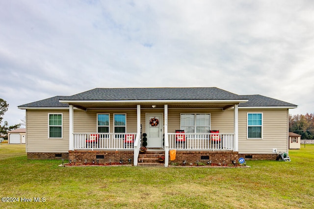 view of front facade with a porch and a front yard