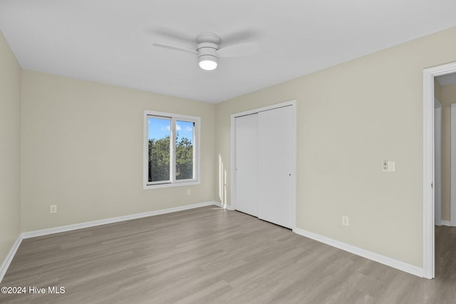 office area with ceiling fan and wood-type flooring