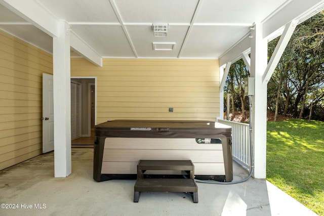 view of patio with a hot tub