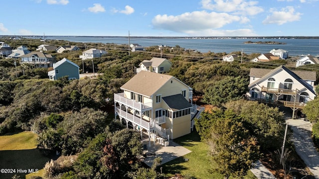 bird's eye view with a water view