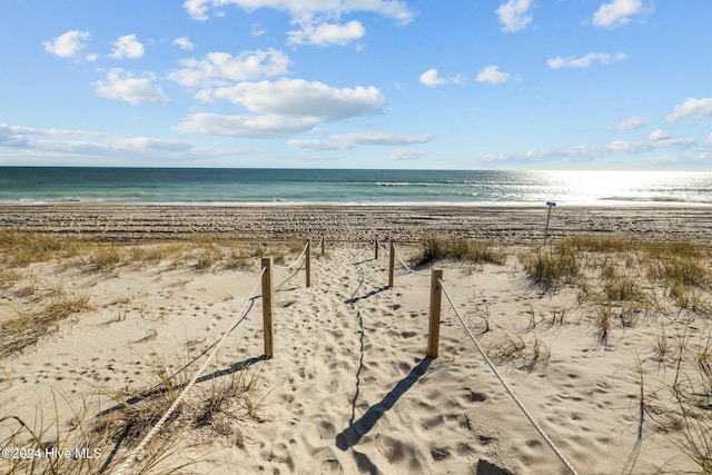 property view of water with a beach view