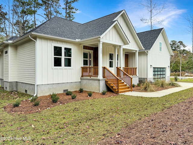 modern farmhouse with a front yard