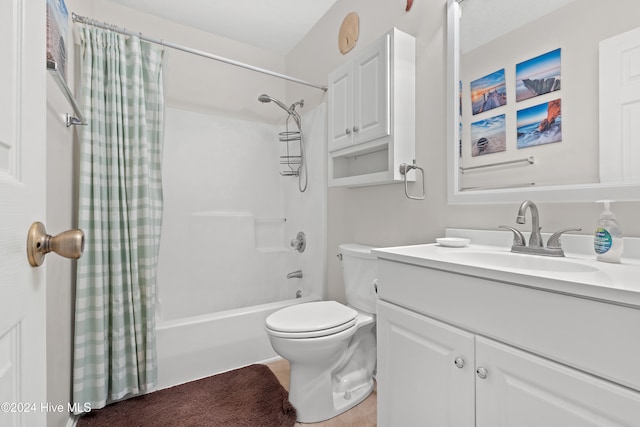 full bathroom with shower / bath combo with shower curtain, vanity, and toilet