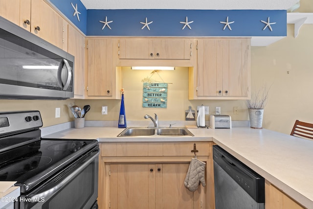 kitchen with light brown cabinetry, sink, a textured ceiling, and appliances with stainless steel finishes