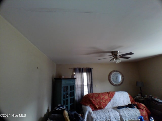 living room featuring ceiling fan