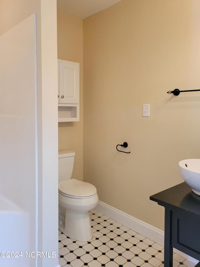 6111 Cutlass Ct, New Bern, NC 28560 - bathroom featuring baseboards, toilet, and vanity