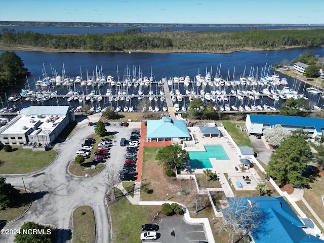 6111 Cutlass Ct, New Bern, NC 28560 - bird's eye view of numerous boat docks, a nearby body of water, and a pool area