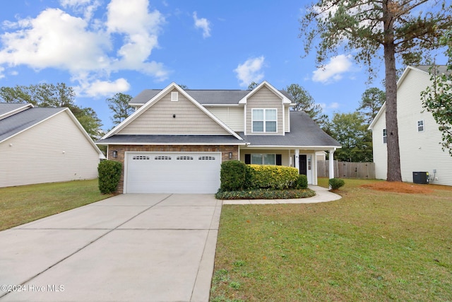 view of front facade featuring central AC unit, a garage, and a front lawn