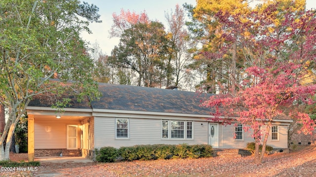 hall with crown molding and hardwood / wood-style floors