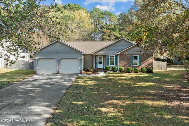 view of front facade featuring a garage and a front yard