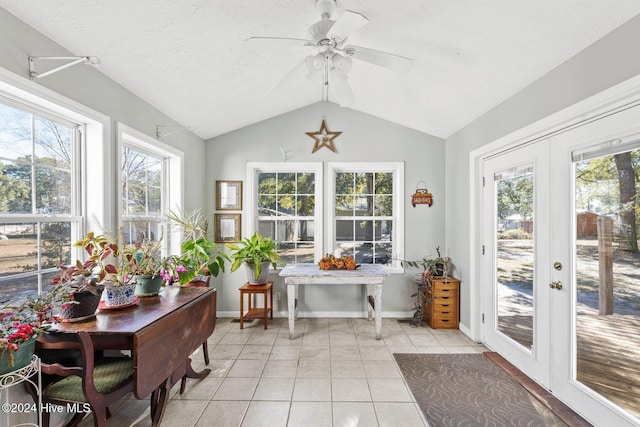 sunroom / solarium featuring french doors, vaulted ceiling, and ceiling fan