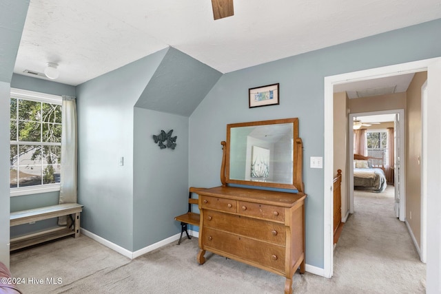 carpeted bedroom featuring ceiling fan and lofted ceiling