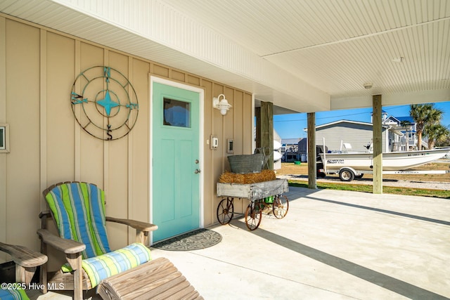 doorway to property with board and batten siding