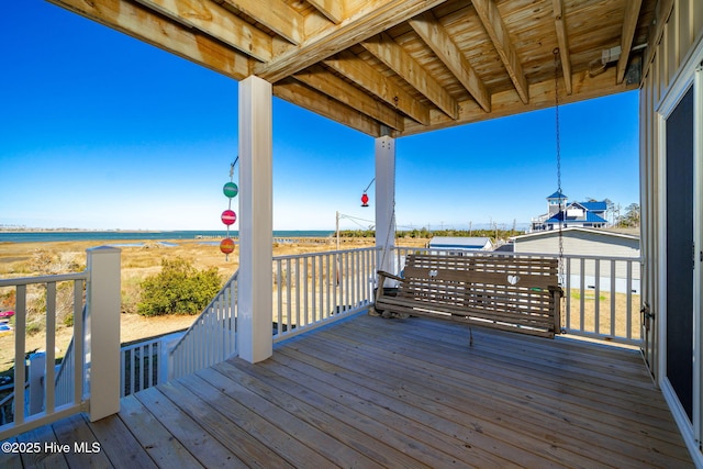 119 E Dr, Harkers Island, NC 28531 - wooden terrace featuring a water view