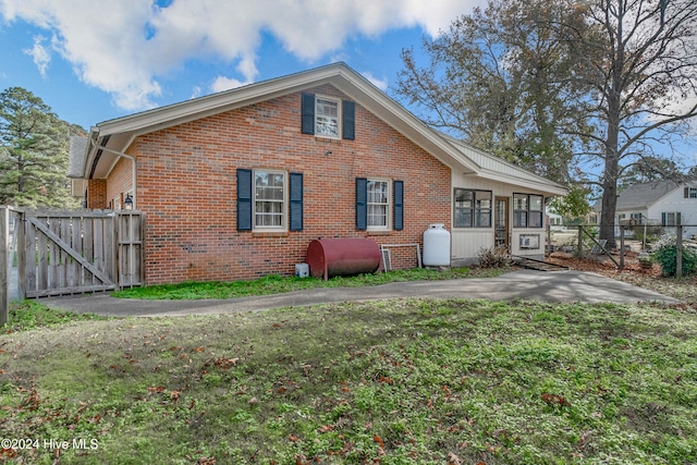 exterior space with a front lawn