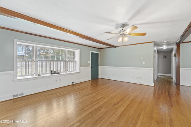 unfurnished living room with ceiling fan, light hardwood / wood-style floors, and ornamental molding